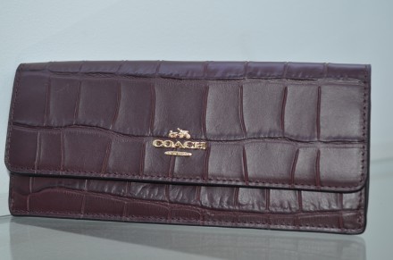 Качественная вещь, новый, оригинал

soft wallet in croc embossed leather

Pr. . фото 2