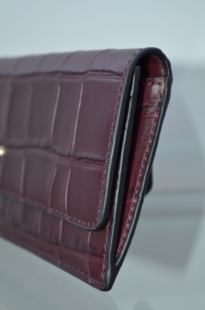 Качественная вещь, новый, оригинал

soft wallet in croc embossed leather

Pr. . фото 4