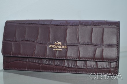 Качественная вещь, новый, оригинал

soft wallet in croc embossed leather

Pr. . фото 1