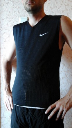 Двостороння майка Nike - ідеальний варіант для занять будь-яким видом спорту (бі. . фото 2
