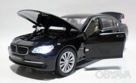 BMW 750Li. Коллекционная модель автомобиля.
Масштаб: 1:32
Цвет: черный / шампа. . фото 1