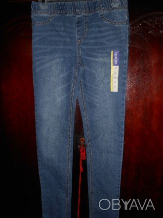 джинсы на 14 лет,пояс резинка,новые с бирками.
замеры: длина-96 см.,  ПО пояса-. . фото 1