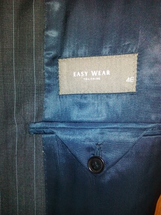 Пиджак размер 46(наш)новый ,материал верха 99% шерсть,серого цвета в лёгкую поло. . фото 4