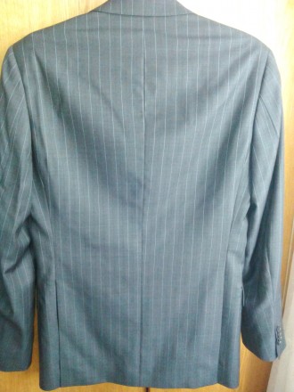 Пиджак размер 46(наш)новый ,материал верха 99% шерсть,серого цвета в лёгкую поло. . фото 3