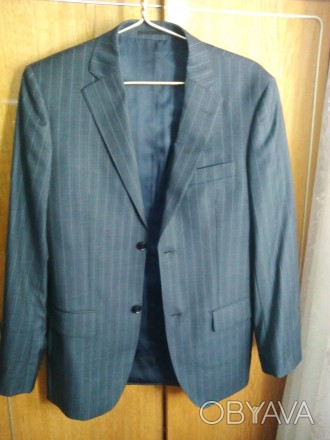 Пиджак размер 46(наш)новый ,материал верха 99% шерсть,серого цвета в лёгкую поло. . фото 1
