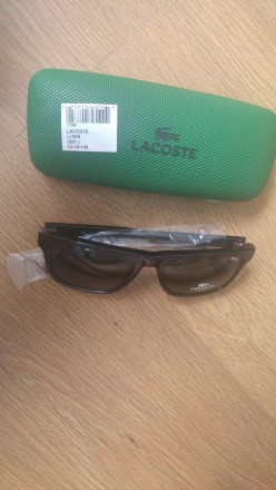 Lacoste L780S 001 
Эти солнцезащитные очки L780S имеют стильный черный, в сочет. . фото 7