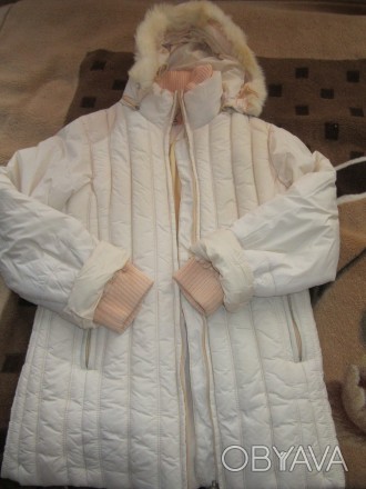 Зимняя куртка нежно- персикового цвета 44-46 р.Очень тёплая,есть вязаный воротни. . фото 1