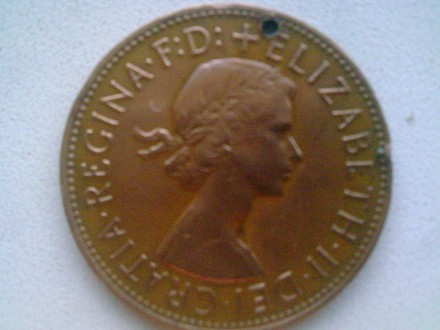 Монета 1 пенни 1964 год, Великобритания. Есть недостаток готовности возле края. . фото 3