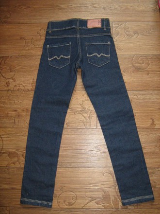 Синие джинсы, очень хорошего качества, плотный коттон,классический пошив,размер1. . фото 3