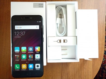 Продам новый,оригинальный телефон Xiaomi Redmi 4X 2/16GB  Черный в пленках.Полны. . фото 2
