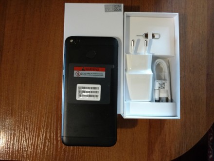 Продам новый,оригинальный телефон Xiaomi Redmi 4X 3/32GB Черный в пленках,глобал. . фото 3