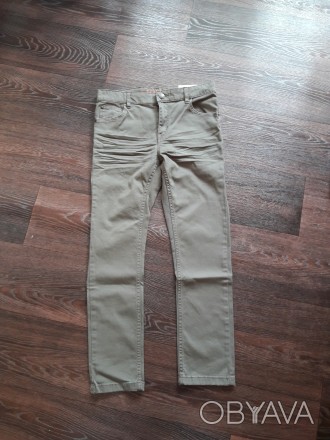 Продам новые джинсы фирмы Н&М. Возраст 9-10 лет. Не плотный джинс, похож на брюк. . фото 1