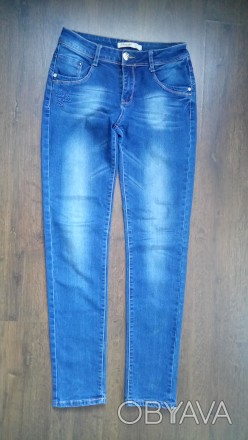 Женские джинсы в хорошем состоянии, без потертостей,, длина 100 см, посадка 23 с. . фото 1