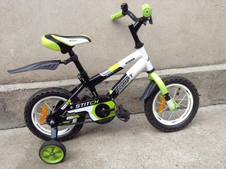 Продам детский велосипед в отличном состоянии, с дополнительными боковыми колеса. . фото 2