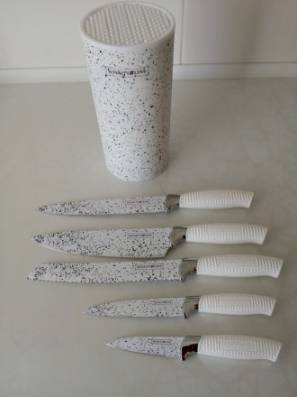 Метало-керамічні ножі
Стан: нові
Колір: Білий
Підставка плюс 5 ножів. . фото 5