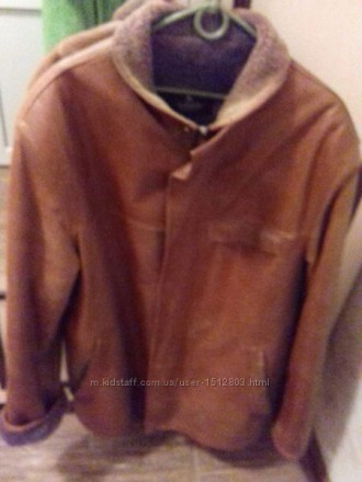 Продам коричневую кожаную курточку в середине натуральный мех ,очень теплая.. . фото 8