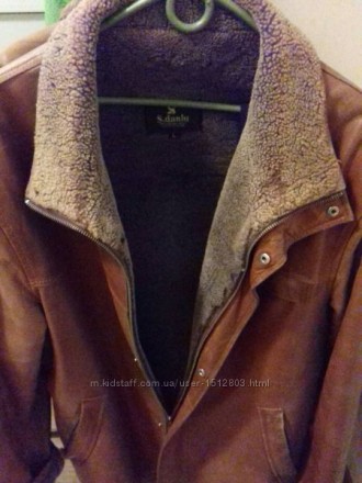 Продам коричневую кожаную курточку в середине натуральный мех ,очень теплая.. . фото 7