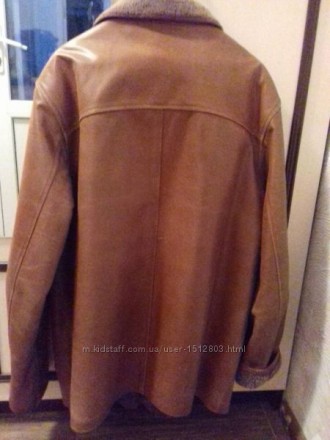 Продам коричневую кожаную курточку в середине натуральный мех ,очень теплая.. . фото 3
