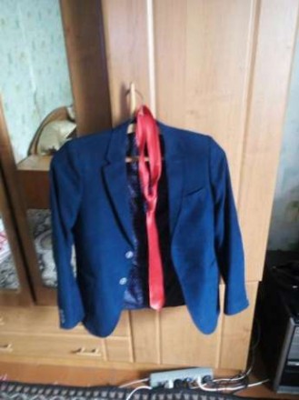 Пиджак школьный синего цвета, шикарного качества в отличном состоянии. Без дефек. . фото 2