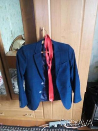 Пиджак школьный синего цвета, шикарного качества в отличном состоянии. Без дефек. . фото 1