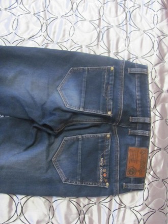 джинсы теплые на флисе,синего цвета( Турция),в отличном состоянии,без потертосте. . фото 3