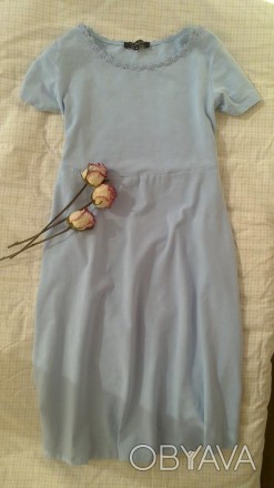 Очень нежное и милое платье клеш нежно голубого цвета.
Размер М.
Грудь 37
Тал. . фото 1