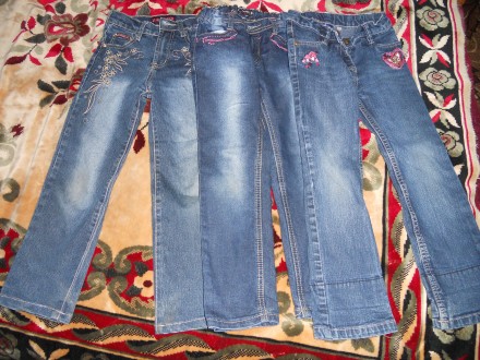 джинсы  в идеальном состоянии!
Джинсы все регулируются резинкой!
джинсы первые. . фото 2