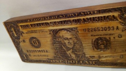 Продам сувенирный доллар вырезанный на массиве дерева 

Размеры:
124х90х15 мм. . фото 5