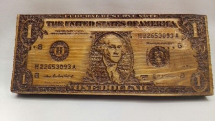 Продам сувенирный доллар вырезанный на массиве дерева 

Размеры:
124х90х15 мм. . фото 2