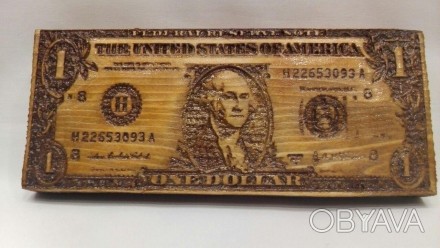 Продам сувенирный доллар вырезанный на массиве дерева 

Размеры:
124х90х15 мм. . фото 1