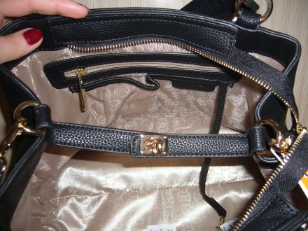 Нова, стильна, містка сумка Michael Kors.

Розміри: ширина 33 см х висота 28 с. . фото 4