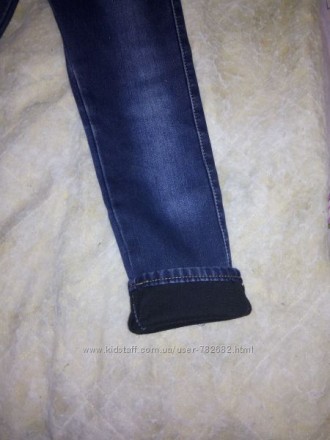 Продам зимние джинсы на флисе . На 9 лет, состояние новых. Замеры: Внешняя длина. . фото 4
