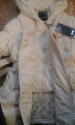 Зимняя курточка с капюшоном на девушку. Размер указан XXL, но как по мне то мало. . фото 8