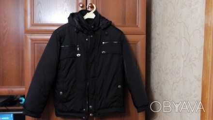 Куртка зимняя черного цвета на мальчика,длина по спине 62 см,рукав от плеча 58 с. . фото 1