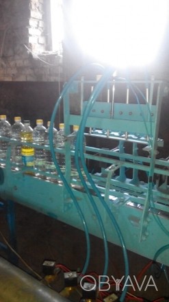 Производительность автоматизированной линии розлива от 600 бутылок в час в завис. . фото 1