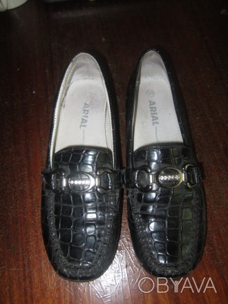Продам осенние туфельки для девочки.35 размер.Цвет- черный. Длина по стельке- 21. . фото 1