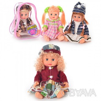 Вміє розмовляти, говорить 5 фраз російською мовою. Лялька в рюкзаку на лямках, щ. . фото 1