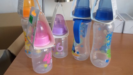 бутылочки с высококачественной пластмассы для кормление разные цвета и размеры. . фото 3