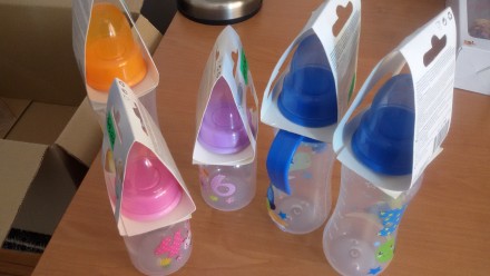 бутылочки с высококачественной пластмассы для кормление разные цвета и размеры. . фото 2