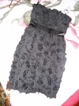 Чёрное платье без бретелек,состояние новой вещи,длинна до колена. . фото 2
