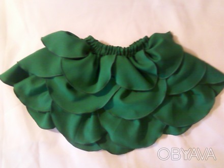 Детская юбка зеленого цвета пошитая из габардина в форме цветка.

Размер: длин. . фото 1