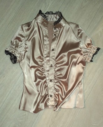 Продам атласную блузку в идеальном состоянии
Блузка из атласа золотистого цвета. . фото 3
