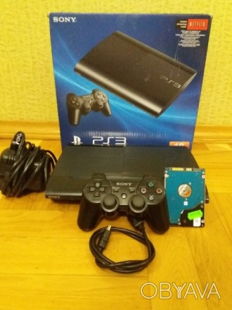 Продам PS3 Super Slim 12 ГБ+жорсткий диск 500GB+віброджойстик, відмінний робочий. . фото 1
