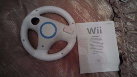 Приставка Nintendo Wii (зарядка, пульты, джойстик, руль, пистолет и ракетки в ко. . фото 5