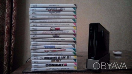 Приставка Nintendo Wii (зарядка, пульты, джойстик, руль, пистолет и ракетки в ко. . фото 1