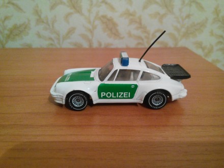 Коллекционная модель PORSCHE 911 масштаб 1:64. Германия.
Была куплена в Германи. . фото 2