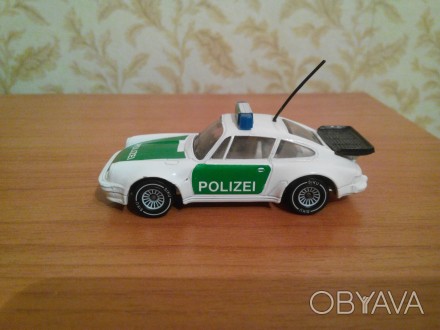 Коллекционная модель PORSCHE 911 масштаб 1:64. Германия.
Была куплена в Германи. . фото 1