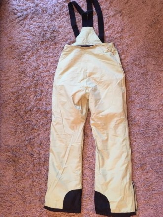 Продам новые лыжные штаны салатового цвета (размер М), длинна штанов - 106 см.
. . фото 3