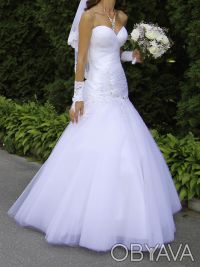 Продам оригинальное свадебное платье, которое выгодно подчеркивает фигуру невест. . фото 7