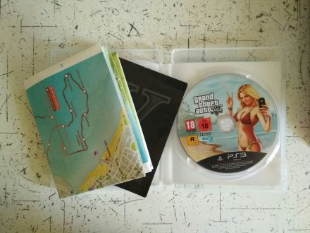 Игра на диске Grand Theft Auto V ГТА5 на русском языке, в идеальном состоянии
т. . фото 3